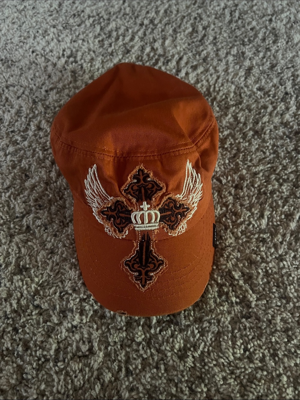 Woman’s Orange Embroidered Cross Cap with Winged Crown